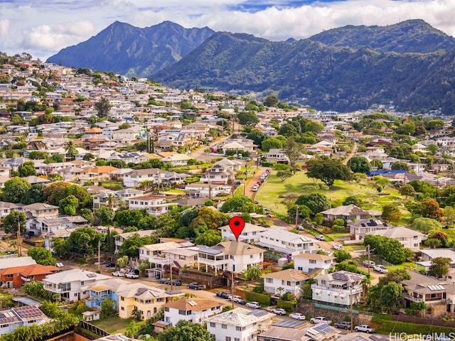 birds eye view of property featuring a mountain view