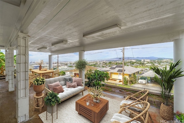 sunroom with a mountain view