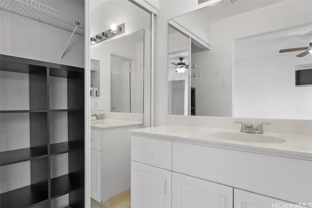 bathroom featuring vanity and ceiling fan