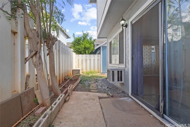 view of property exterior featuring a patio