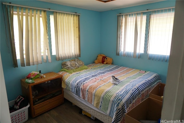 bedroom featuring dark hardwood / wood-style floors