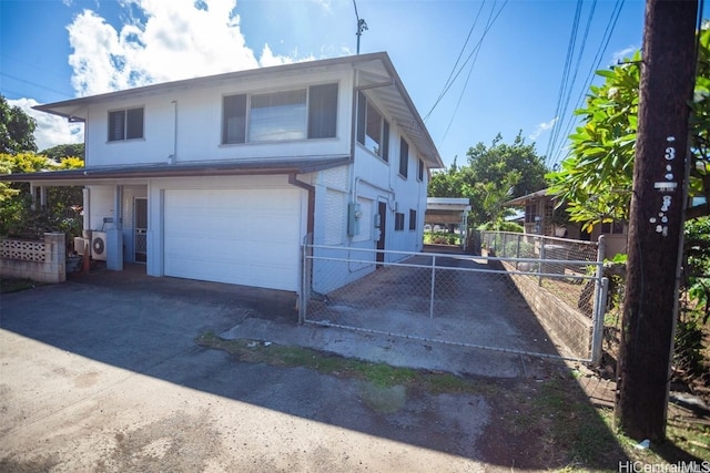 view of front of home featuring a garage