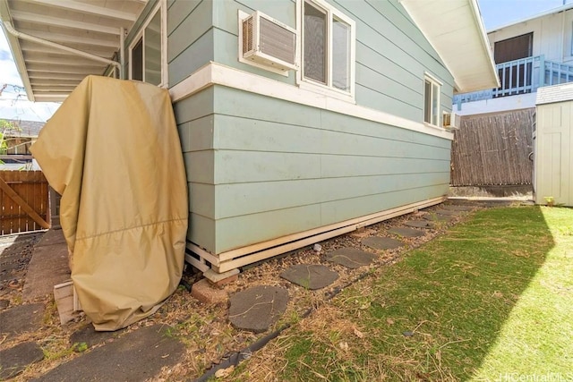 view of side of home with cooling unit