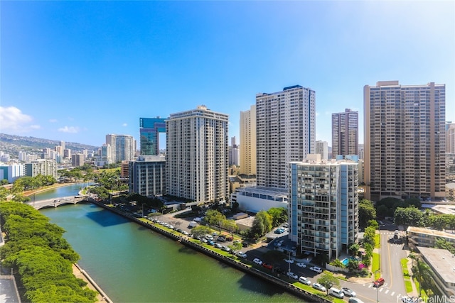 property's view of city with a water view