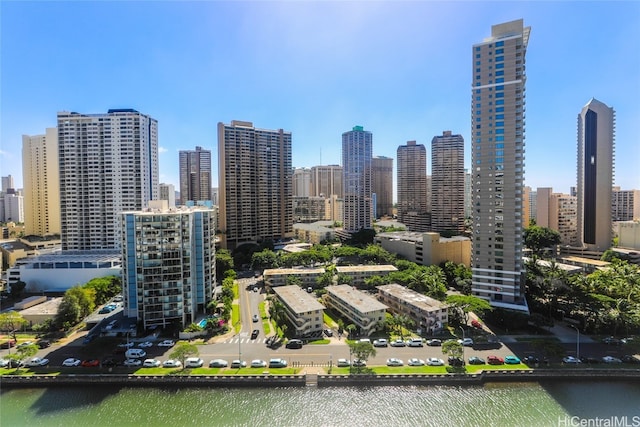 property's view of city featuring a water view