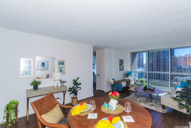1848 Kahakai Dr Unit 1904, Honolulu, HI 96814 - dining space with a textured ceiling, wood finished floors, and a wall of windows