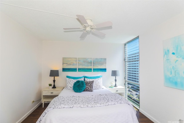 1848 Kahakai Dr Unit 1904, Honolulu, HI 96814 - bedroom featuring dark wood-type flooring and ceiling fan