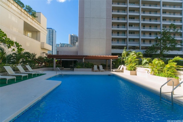 1848 Kahakai Dr Unit 1904, Honolulu, HI 96814 - community pool featuring a patio and a view of city