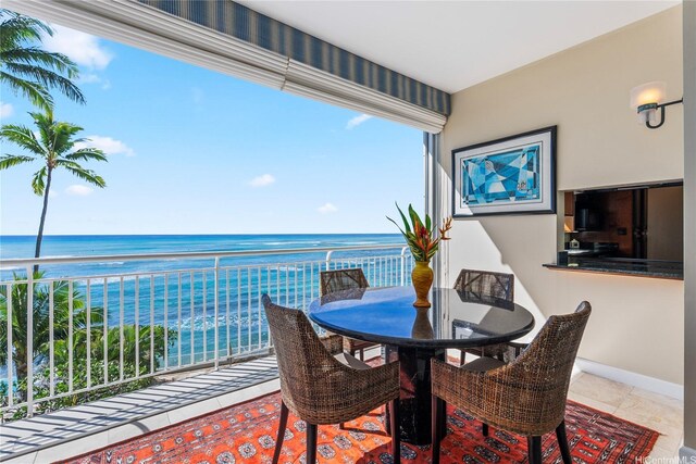 2969 Kalakaua Ave Unit 202, Honolulu, HI 96815 - dining space with a water view and baseboards