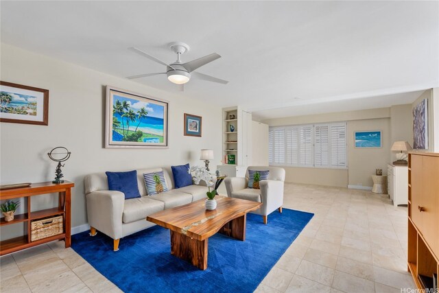 2969 Kalakaua Ave Unit 202, Honolulu, HI 96815 - living area with ceiling fan, baseboards, and light tile patterned flooring