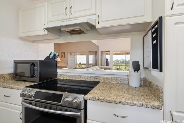 kitchen featuring under cabinet range hood, white cabinetry, and stainless steel range with electric cooktop