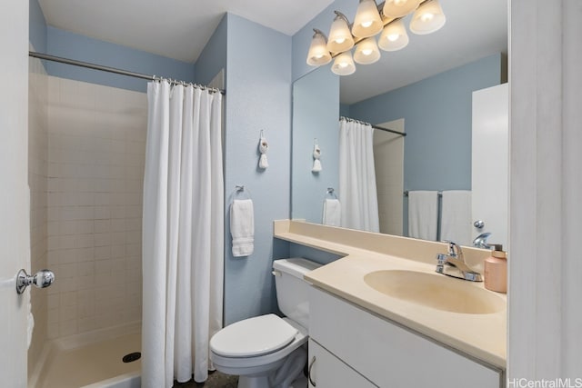 bathroom with a shower with curtain, toilet, and vanity