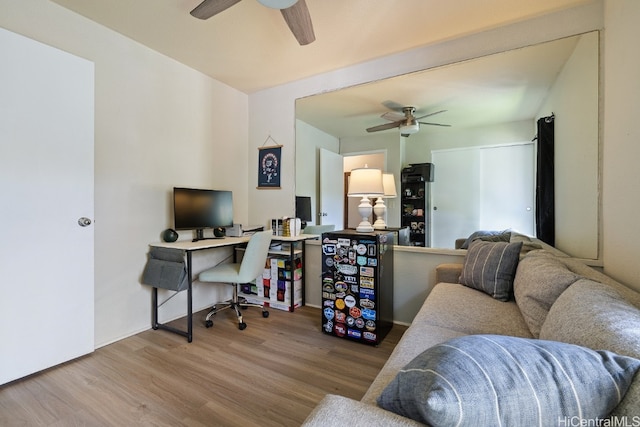 office space featuring a ceiling fan and wood finished floors