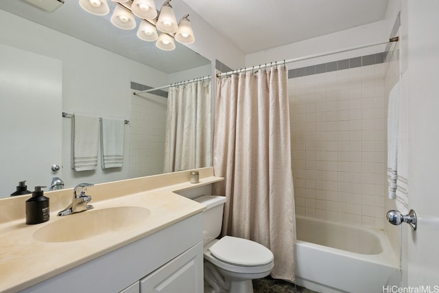 bathroom featuring visible vents, toilet, shower / bath combo with shower curtain, vanity, and a chandelier