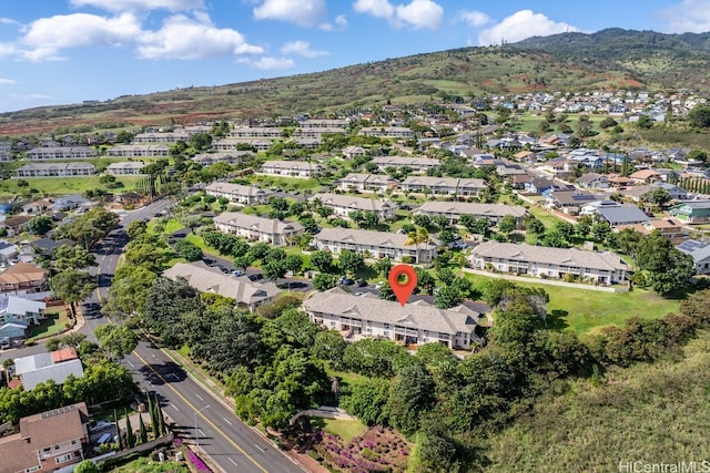 birds eye view of property featuring a mountain view and a residential view