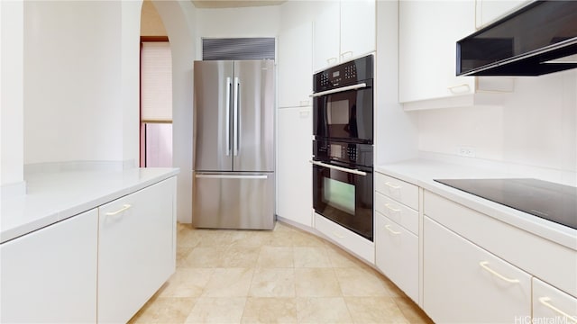 kitchen with white cabinetry and black appliances