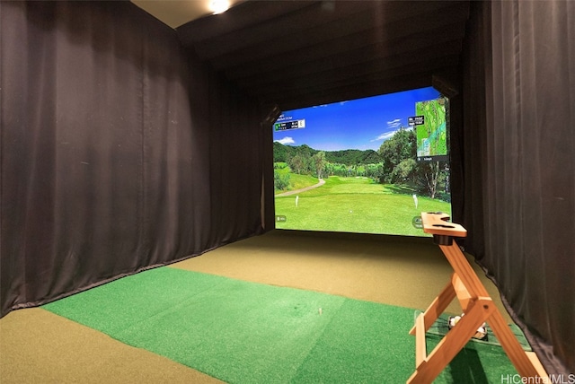 game room with carpet floors and golf simulator