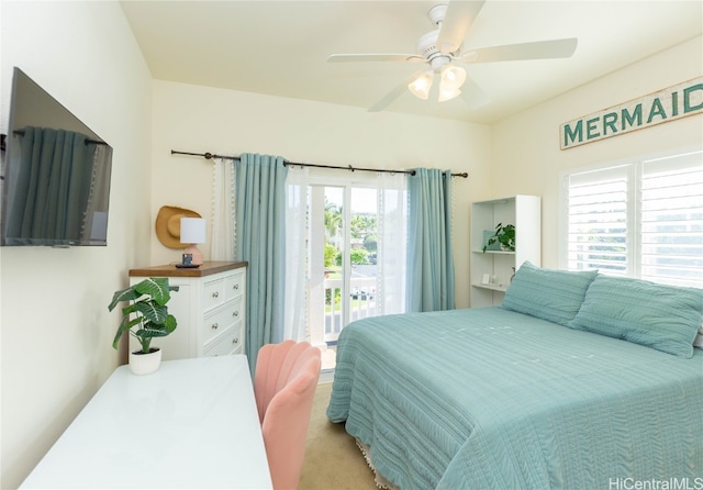 bedroom featuring a ceiling fan and access to outside