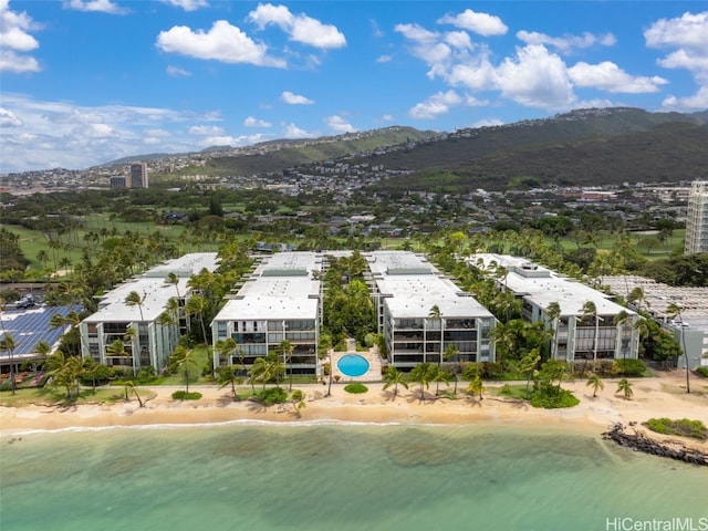 bird's eye view featuring a view of the beach and a water and mountain view