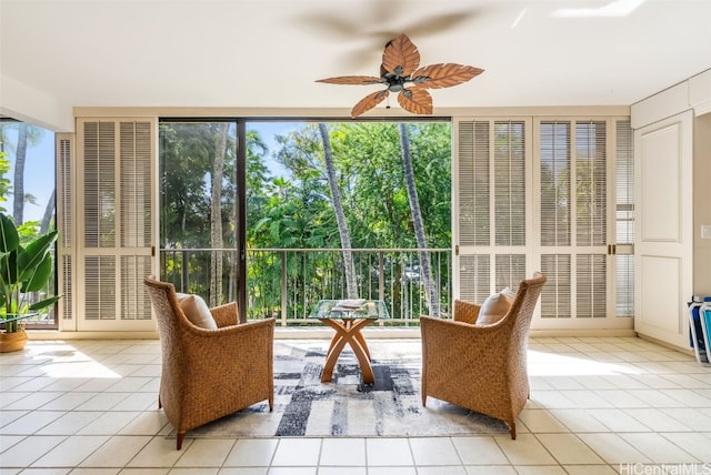 sunroom / solarium with ceiling fan