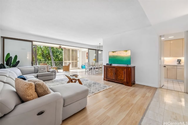 living room with light hardwood / wood-style floors