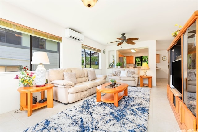 living room with ceiling fan, light tile patterned floors, and a wall mounted AC