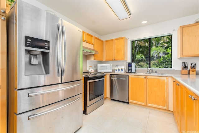 95-1044 Meapa St, Mililani, HI 96789 - kitchen with appliances with stainless steel finishes, light countertops, exhaust hood, a sink, and light tile patterned floors