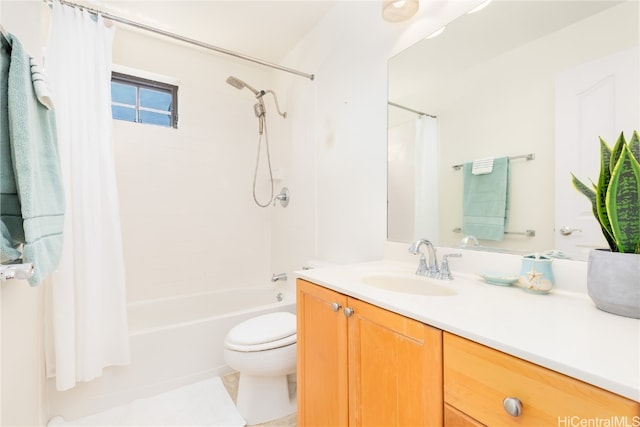 full bathroom featuring tile patterned flooring, vanity, shower / tub combo, and toilet