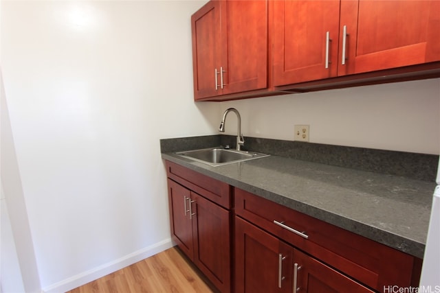 kitchen featuring sink and light hardwood / wood-style floors