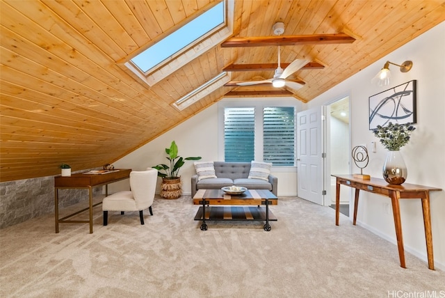 sitting room featuring light carpet, lofted ceiling with skylight, ceiling fan, and wooden ceiling