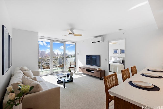 living room featuring a wall unit AC, ceiling fan, carpet, and a wall of windows