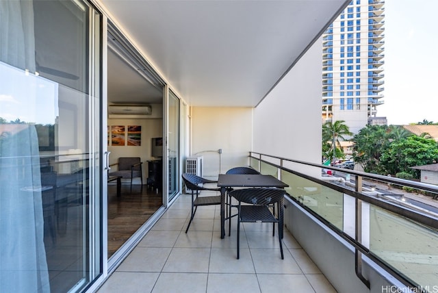 balcony featuring a wall mounted AC