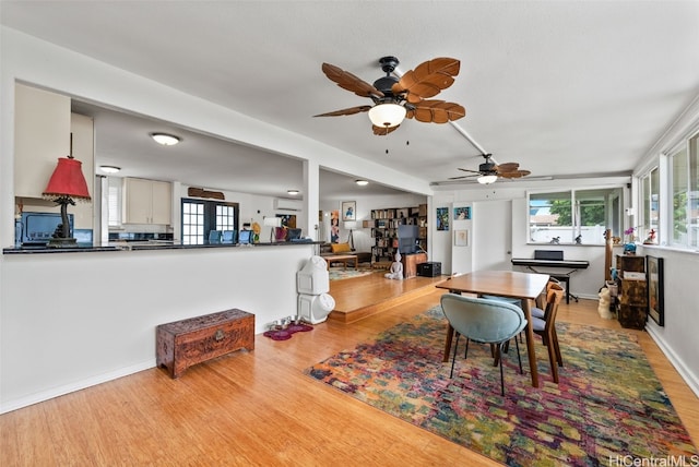 dining area with light hardwood / wood-style flooring