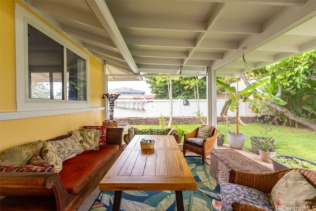 exterior space with coffered ceiling and beam ceiling