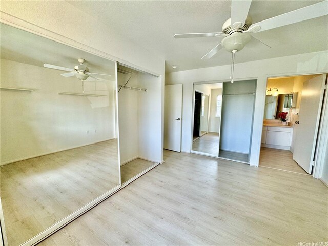 91-1101 Namahoe St Unit 3G, Kapolei, HI 96707 - unfurnished bedroom featuring light wood-style flooring, ceiling fan, and baseboards