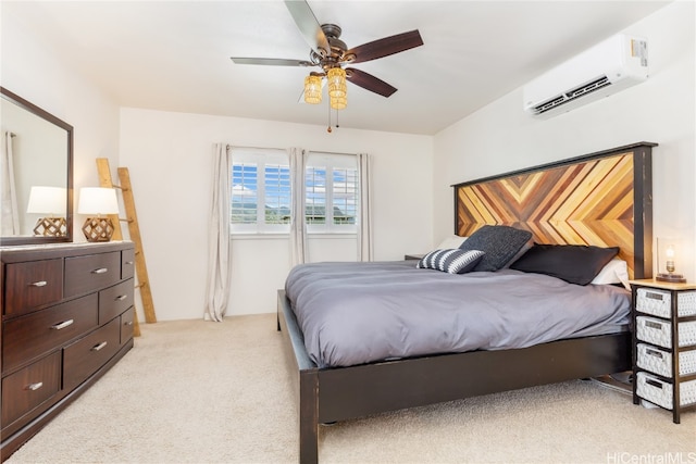 bedroom featuring ceiling fan, light colored carpet, and an AC wall unit