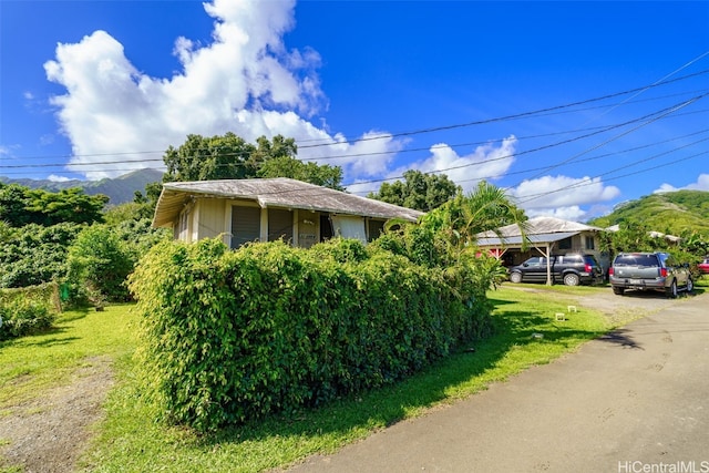 view of home's exterior featuring a yard