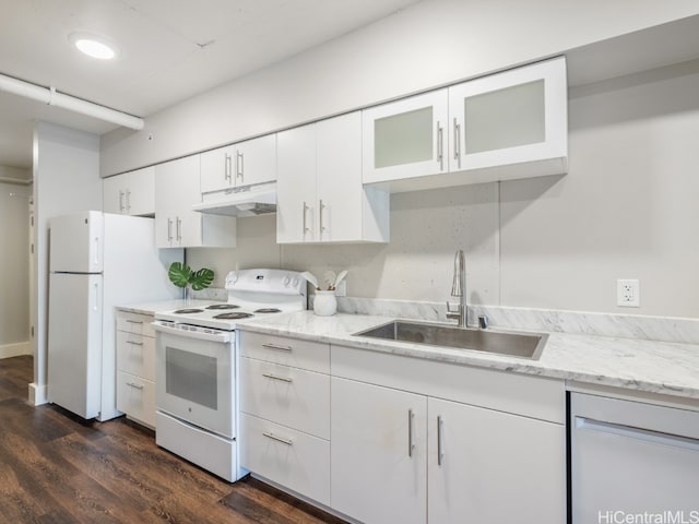 kitchen featuring dark hardwood / wood-style floors, white cabinetry, white appliances, and sink