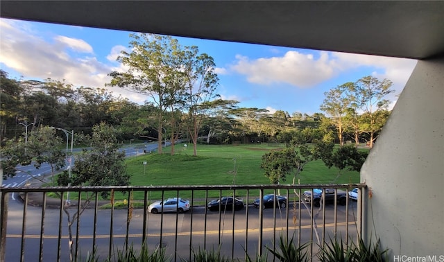 view of yard featuring a balcony