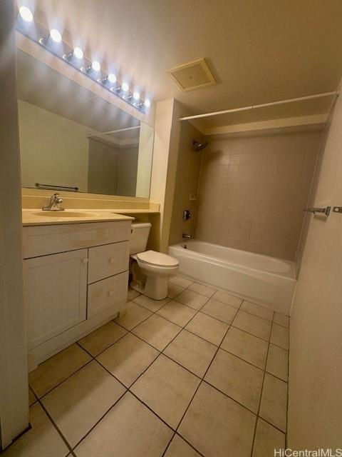 3054 Ala Poha Pl Unit 1906, Honolulu, HI 96818 - bathroom featuring tile patterned floors, tub / shower combination, vanity, and toilet