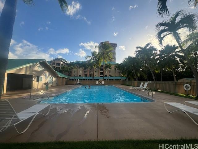 3054 Ala Poha Pl Unit 1906, Honolulu, HI 96818 - community pool featuring a patio area