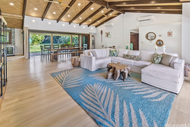 living room featuring beamed ceiling, light wood-type flooring, high vaulted ceiling, and a wall mounted AC