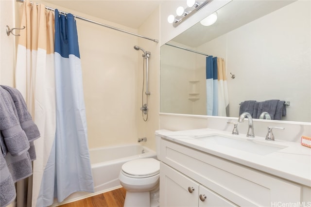 full bathroom featuring hardwood / wood-style floors, vanity, toilet, and shower / bath combination with curtain