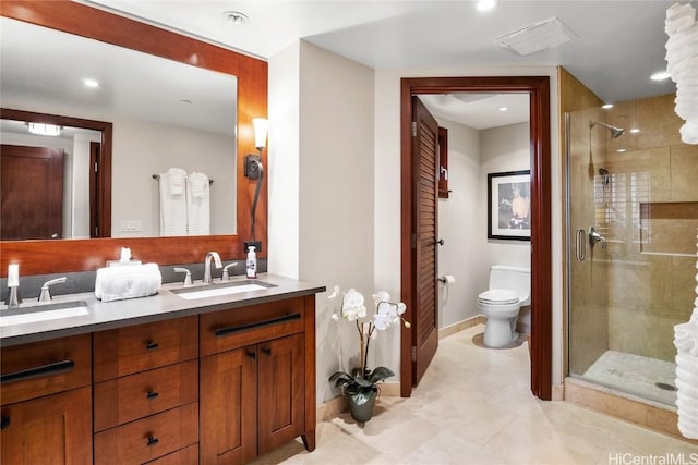 full bath with a stall shower, visible vents, and a sink