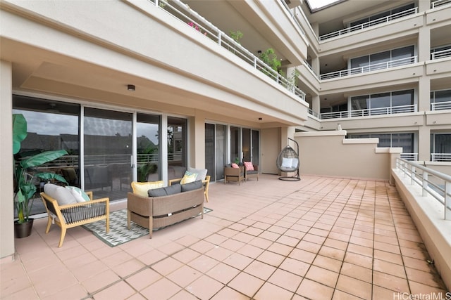 view of patio with a balcony