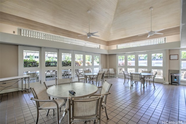 interior space with ceiling fan and lofted ceiling