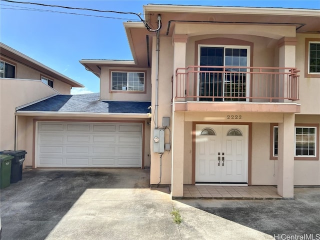 view of property with a balcony