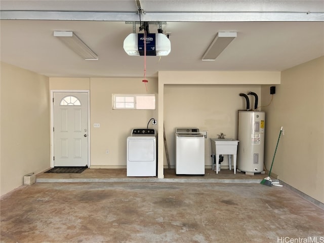 garage featuring water heater, sink, washer and dryer, and a garage door opener