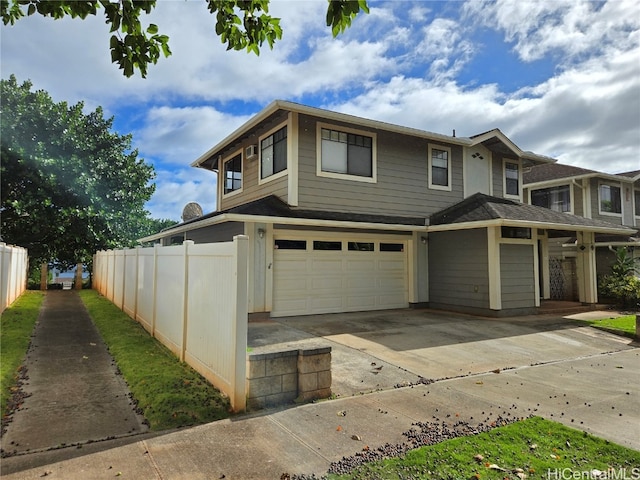 view of front of property featuring a garage