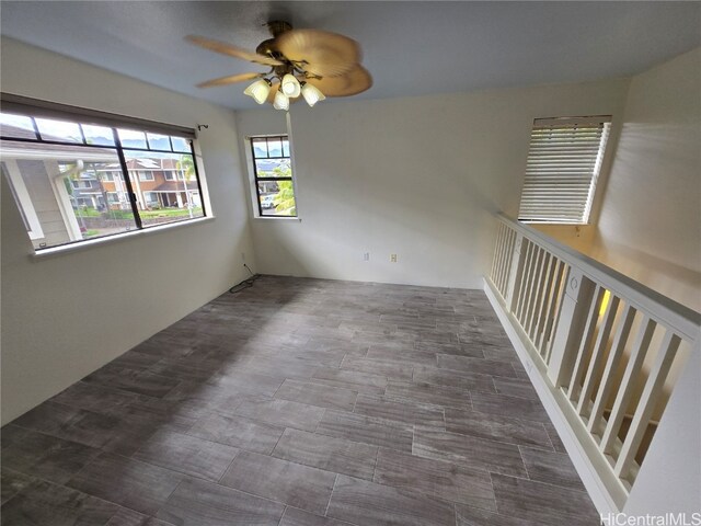 spare room with ceiling fan